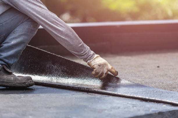 Professional Emergency Waterproofing technician working in Newtonsville, OH